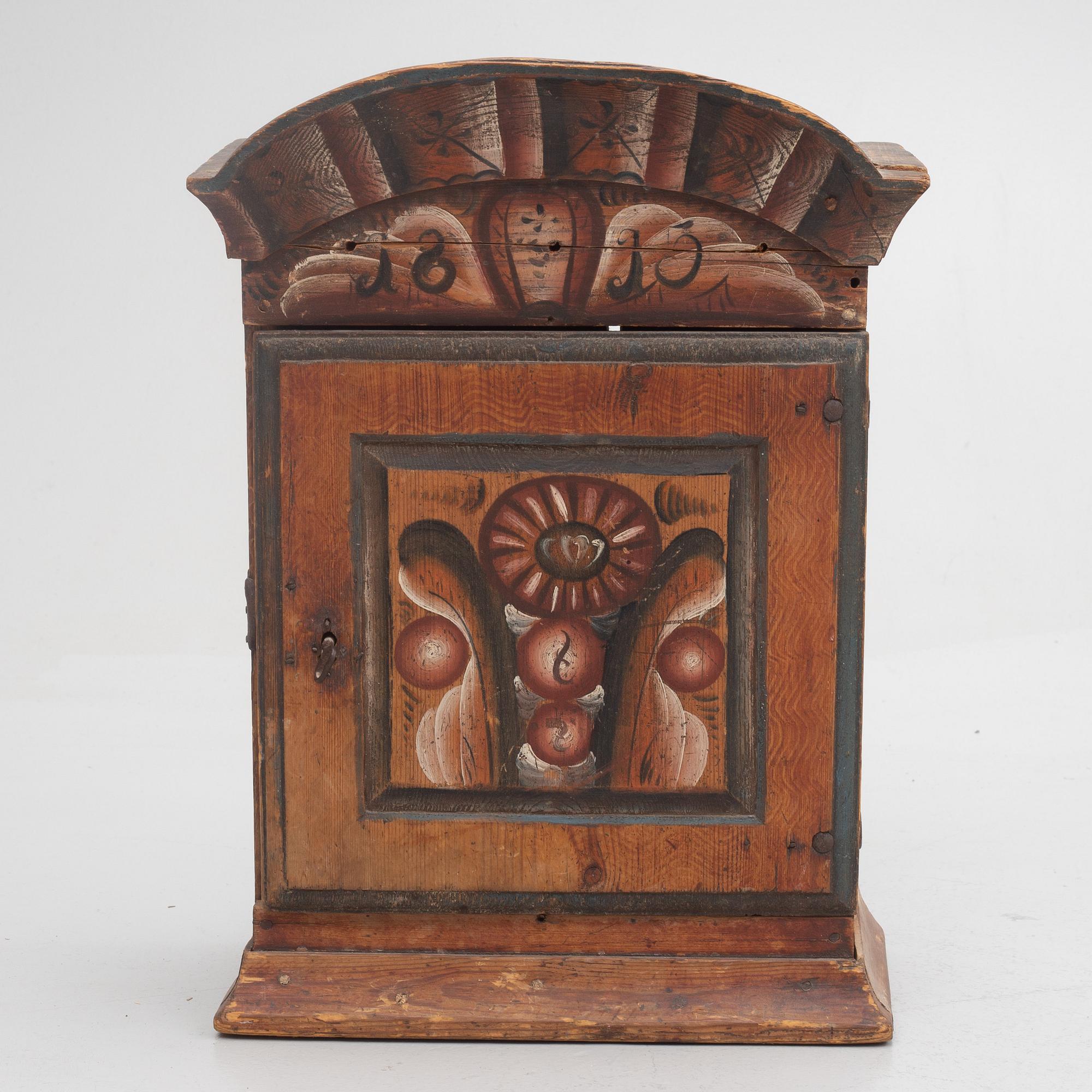 A Swedish wall cabinet, Rättvik, Dalarna, dated 1815.