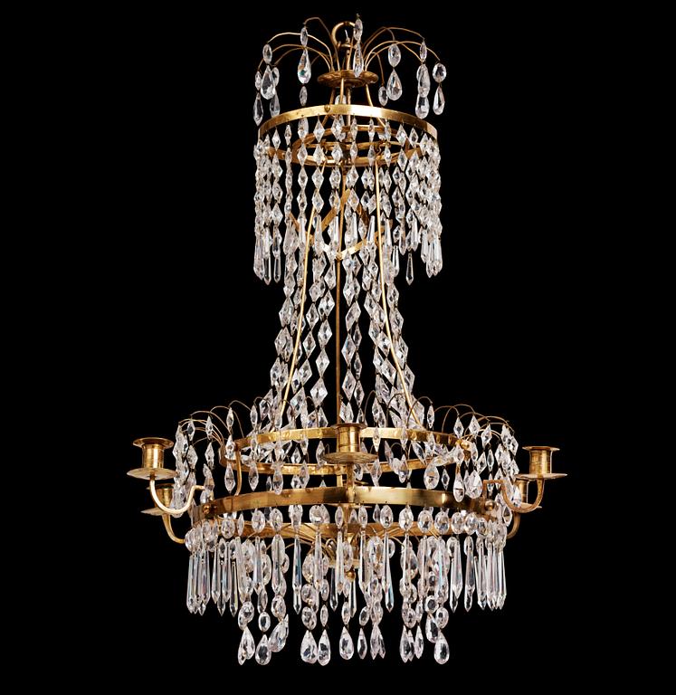 A late Gustavian gilt brass and cut glass seven-branch chandelier, Stockholm, late 18th century.