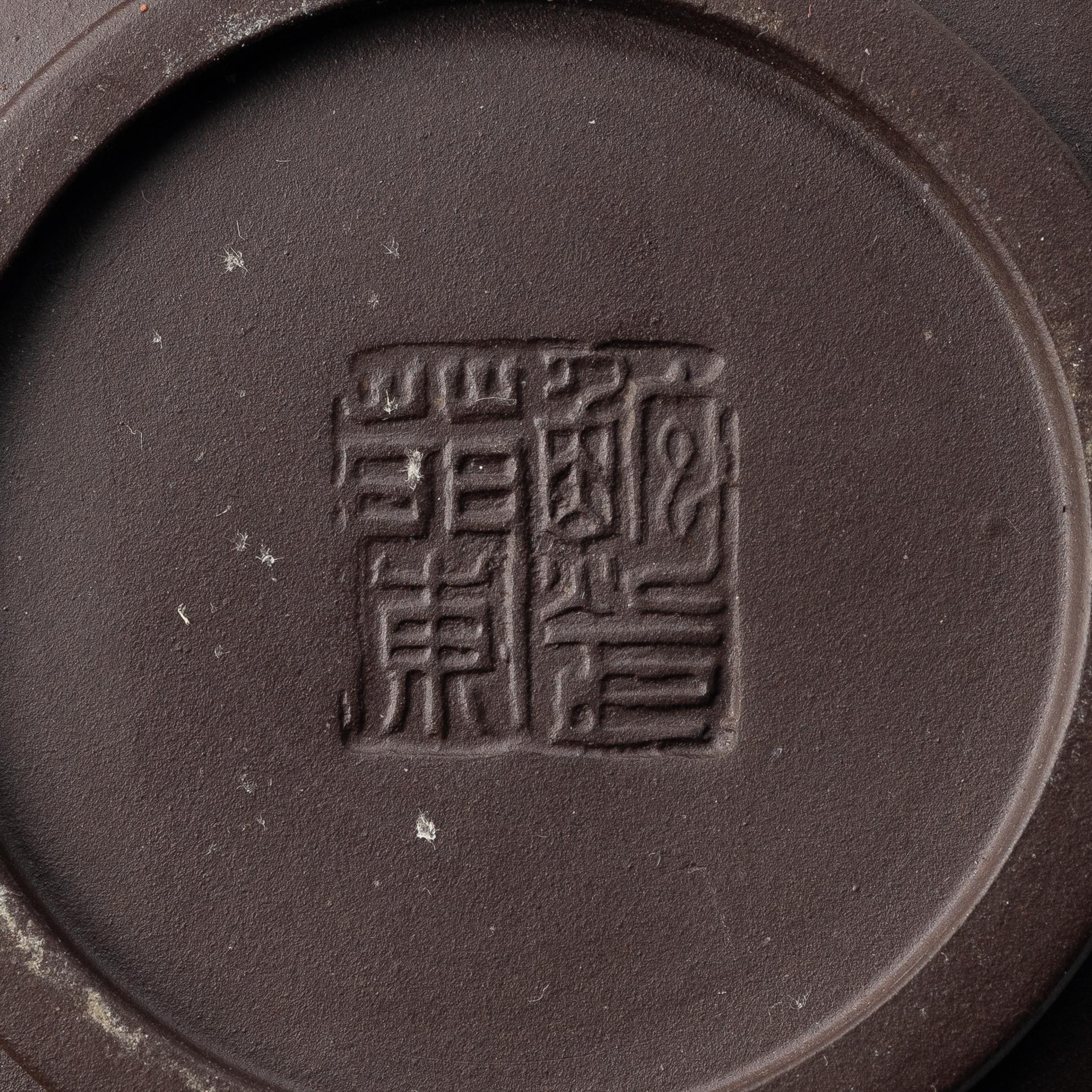 Bao Zhenglan, A brown yixing 'zodiac' teapot, China, 1990s.