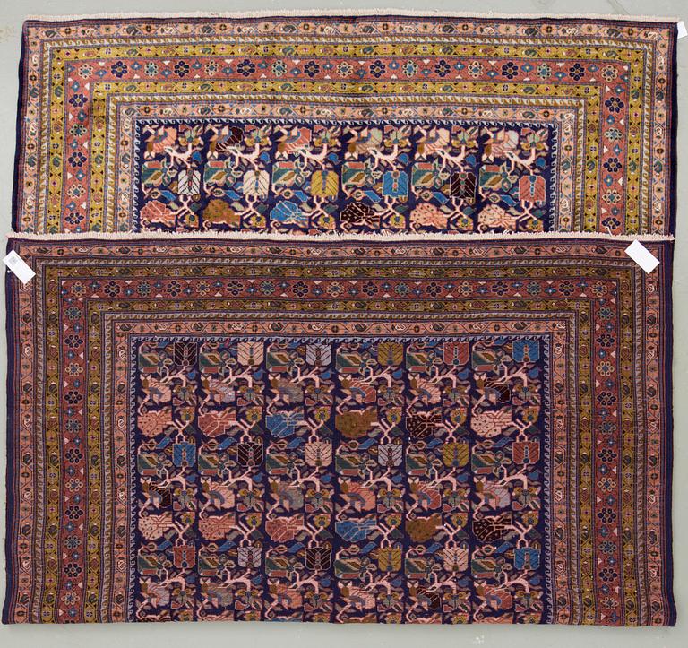 An oriental carpet, around 301 x 199 cm.