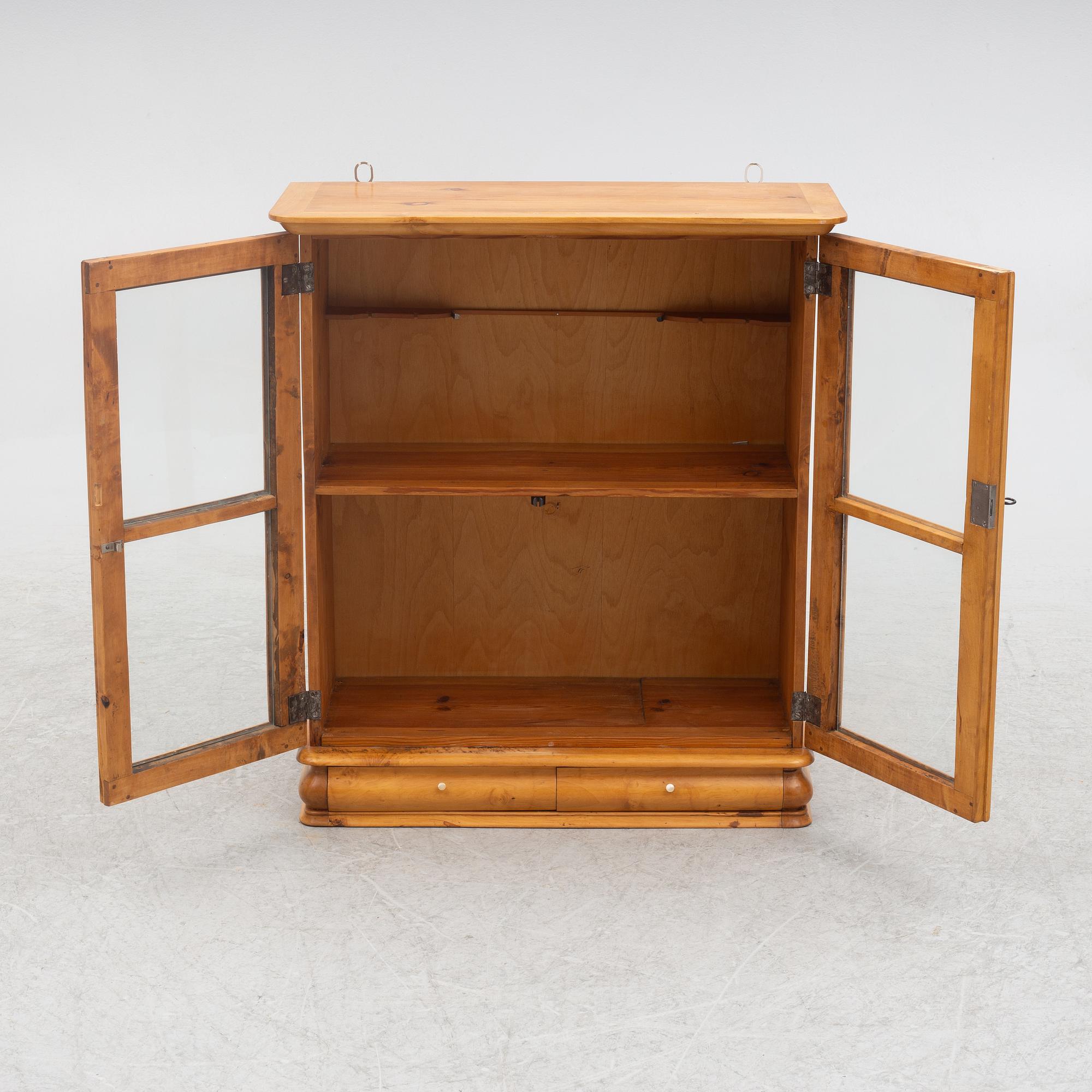 A small wall cabinet, around 1900.