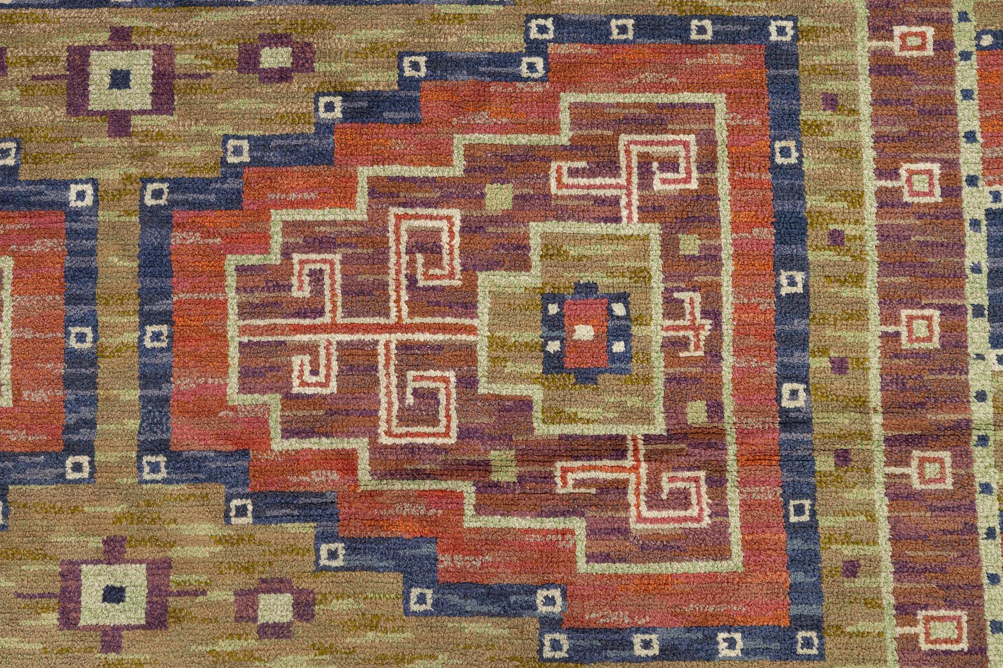 Märta Måås-Fjetterström, a carpet, 'Storkorset' ('Åhléns matta'), knotted pile, c. 380 x 323 cm, signed MMF.