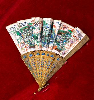 A painted early 1900s Chinese fan.