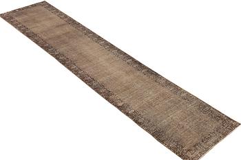 A vintage runner, c. 460 x 80 cm.
