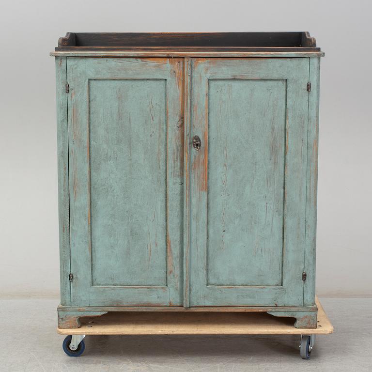 A mid 19th century painted cupboard.