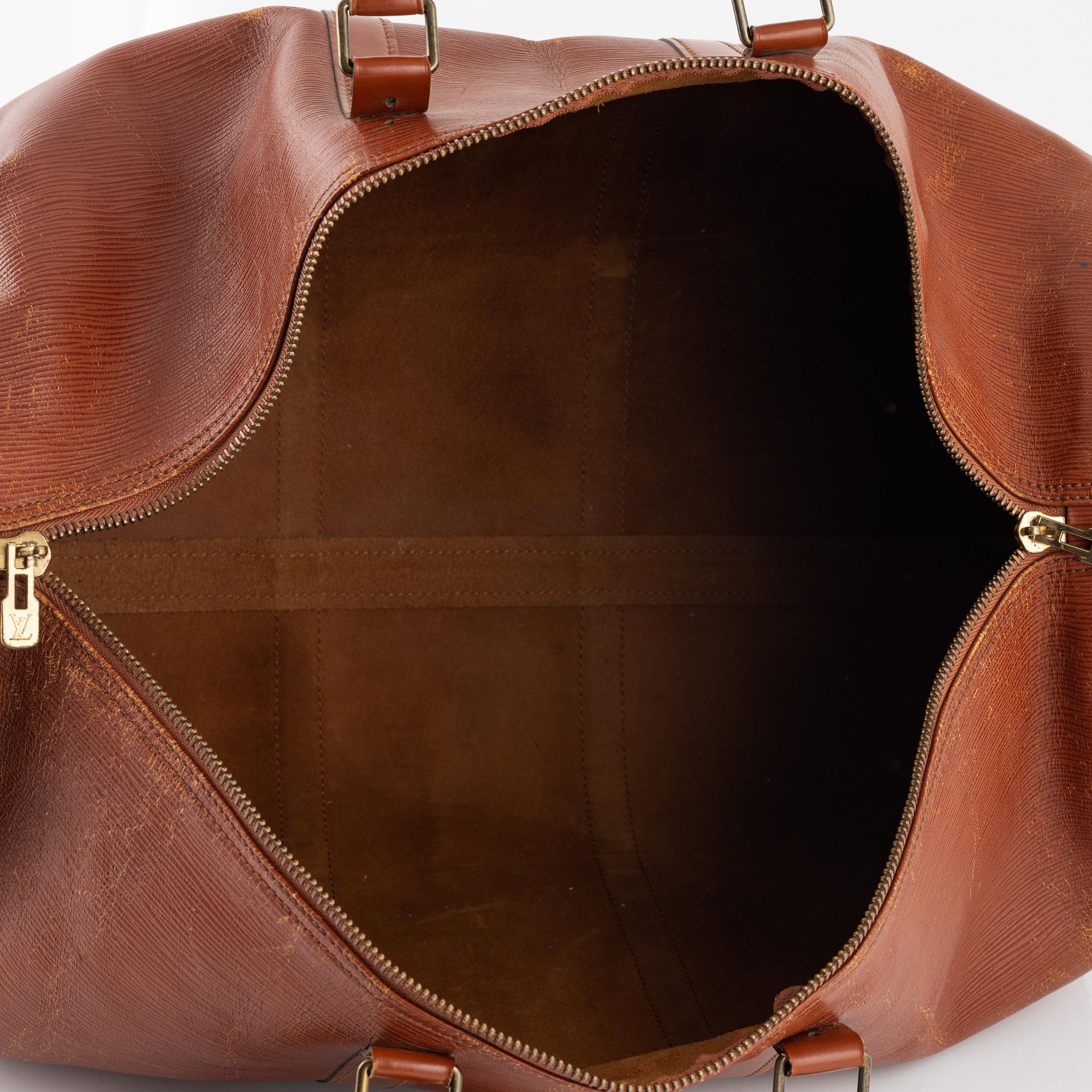 Louis Vuitton, an Epi 'Keepall 55' weekendbag, 1987.