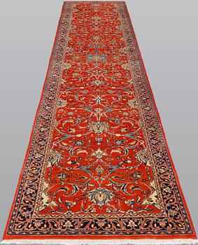 A Sarouk runner, 410 x 80 cm.