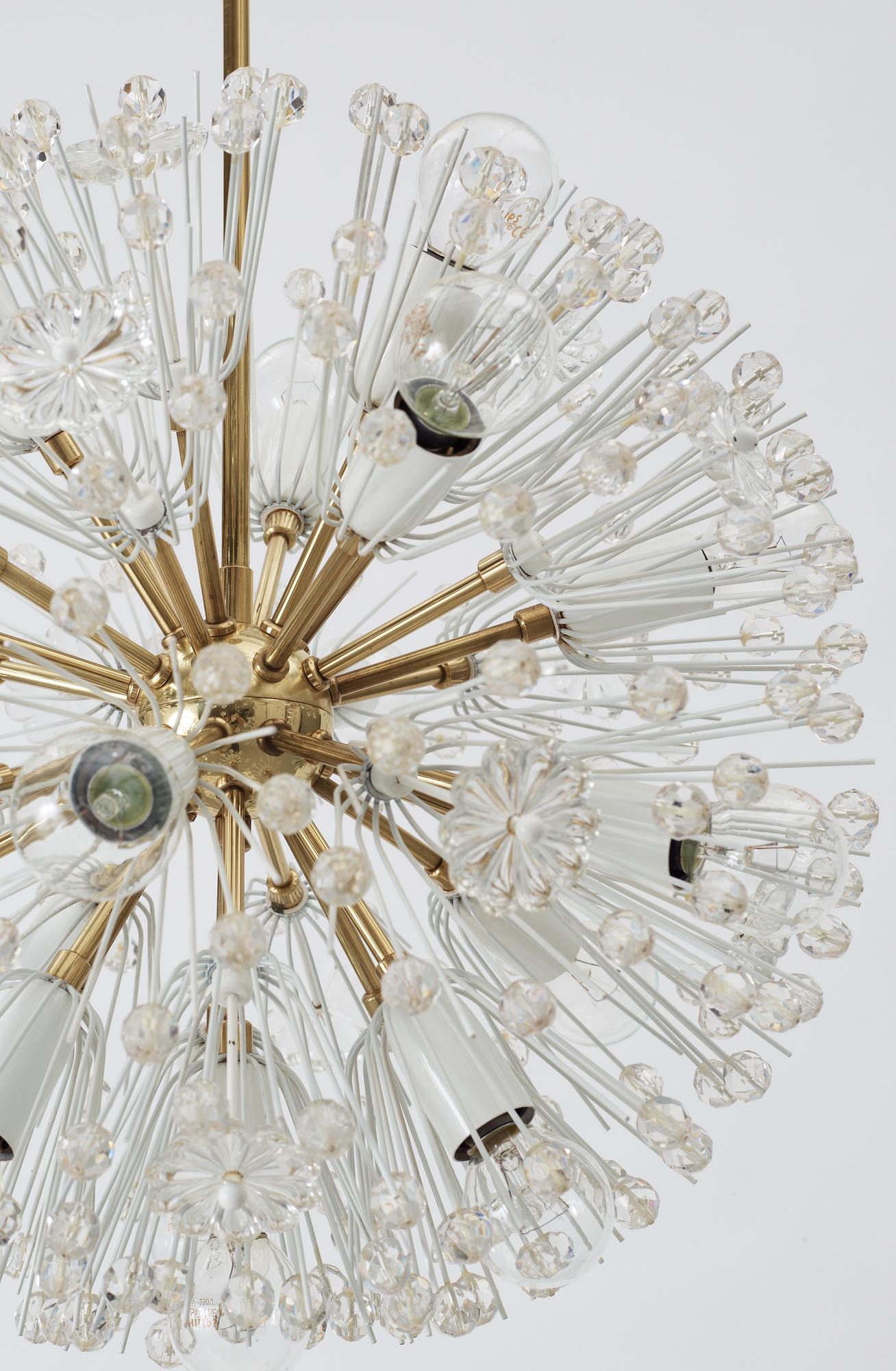 An Emil Stejnar brass crystal chandelier by Rupert Nikoll, Austria.