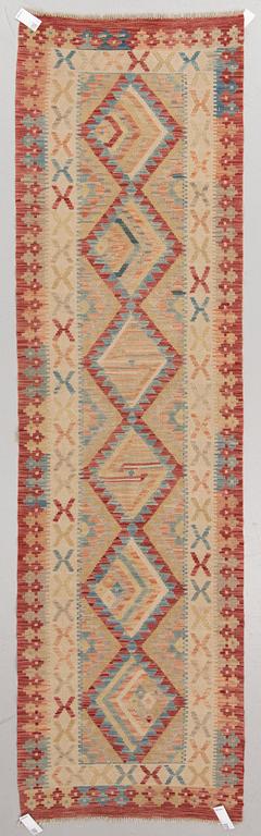 A kilim runner, around 300 x 85 cm.