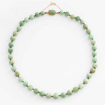 Necklace and a pair of earrings.