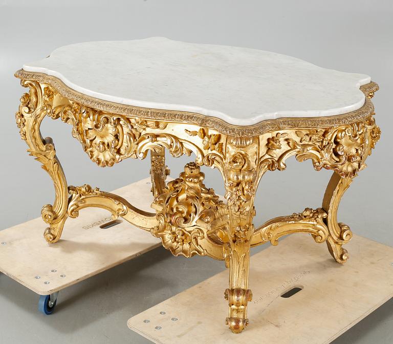 A Louis quinze style table from the later 19th century.