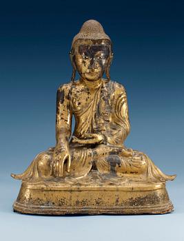 1294. A Burmese gilt bronze figure of Buddha, Mandalay, 19th Century.