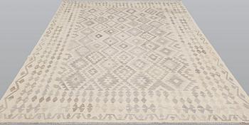 A kilim carpet, c 293 x 203.