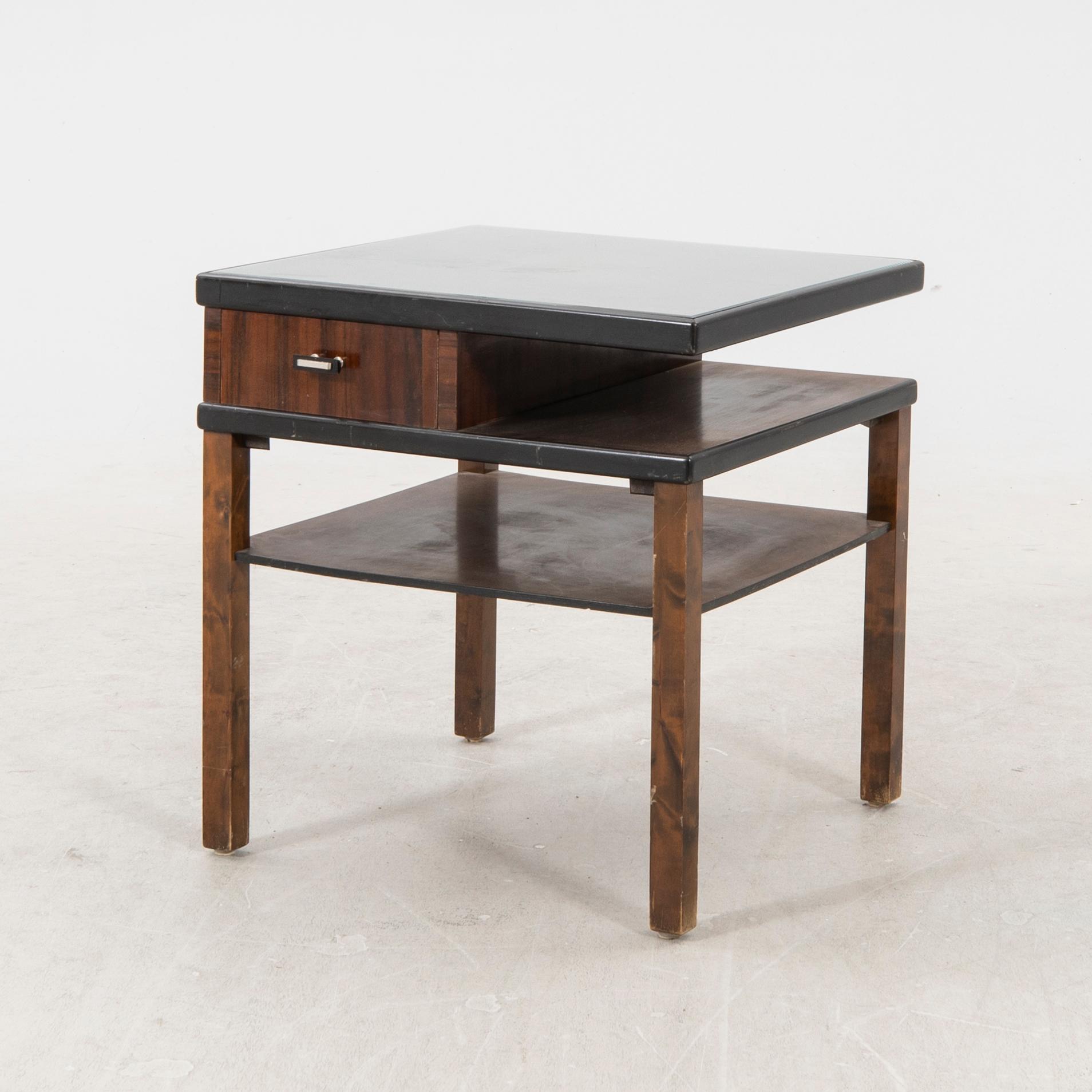 A 1940s birch side table.