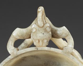 A carved nephrite ceremonial wine cup, late Qing dynasty.
