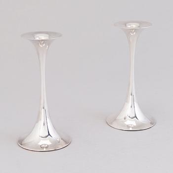 TAPIO WIRKKALA, A pair of 'Trumpetti' silver candlesticks, marked TW, Kultakeskus, Hämeenlinna 1983 and 1986.