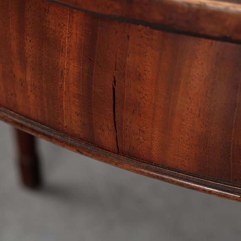 A pair of George III demi-lune mahogany card tables, first half of the 19th Century.