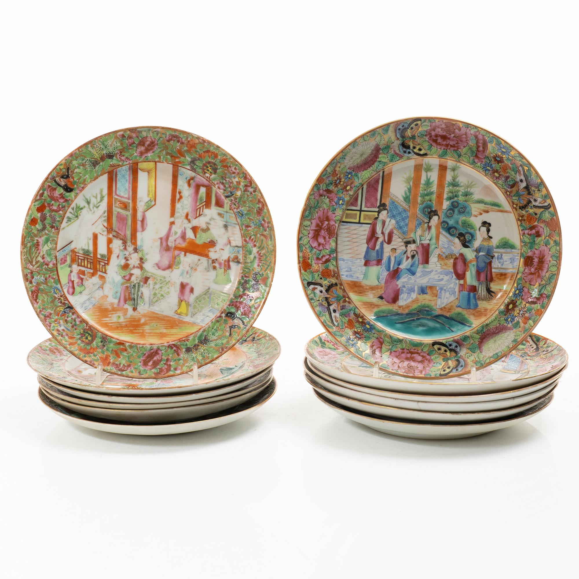 A matched set of 14 famille rose 'Canton' dinner plates, Qing dynasty, 19th century.