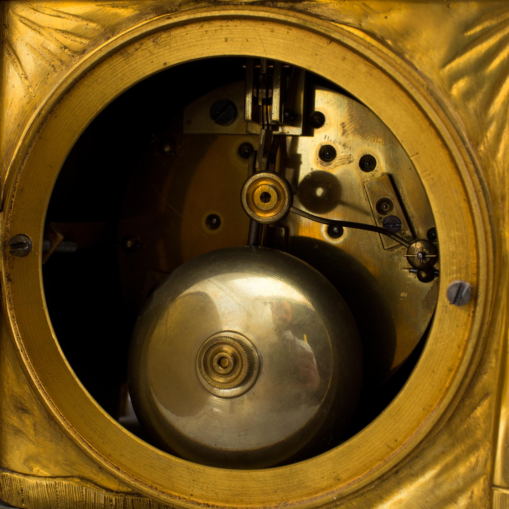 A gilt bronze Empire mantle clock, first half of the 19th Century.