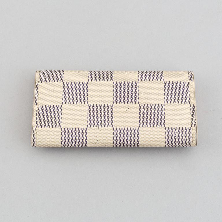 Louis Vuitton, neccessär samt nyckelhållare.