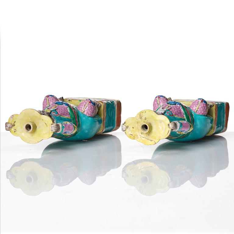 A pair of famille rose candlesticks, Qing dynasty, Qianlong (1736-95).