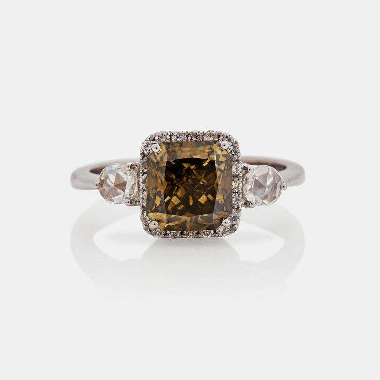 A 2.47 ct natural fancy dark brownish yellow/SI2 diamond ring.