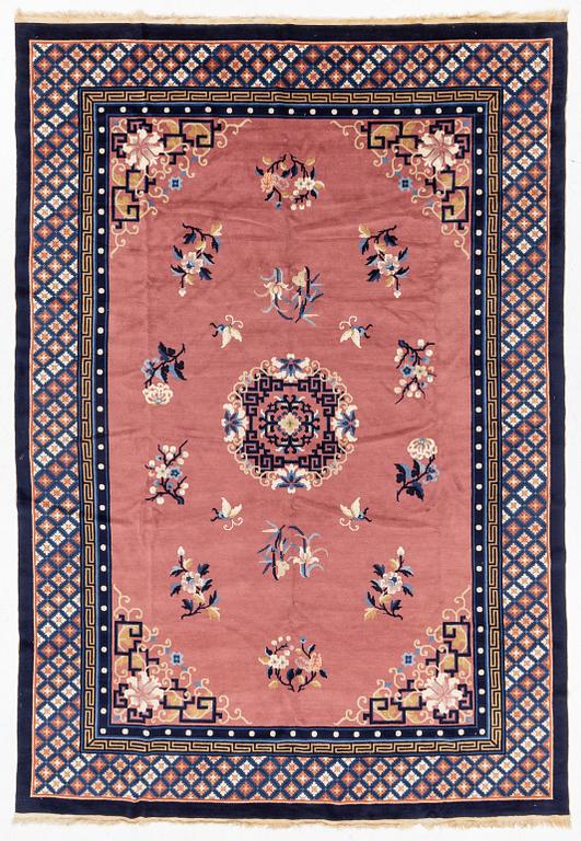 A semi-antique Chinese carpet, c. 305 x 210 cm.