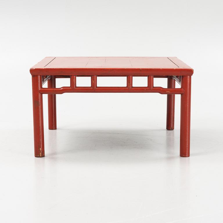 A lacquered table, China, 20th century.