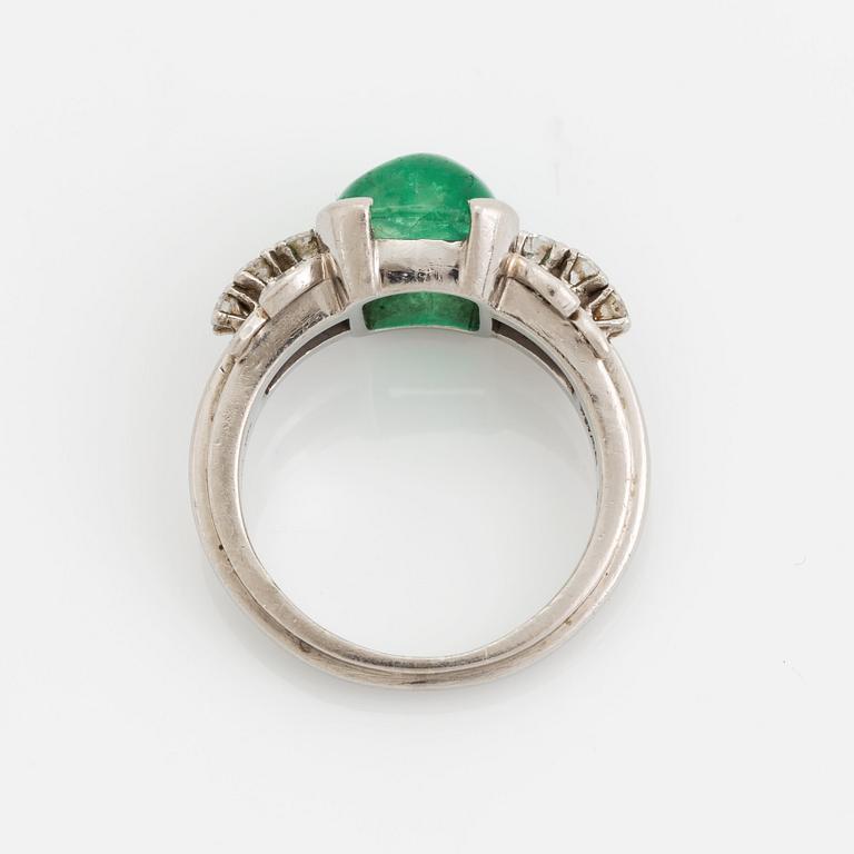 A WA Bolin 18K white gold ring set with a cabochon-cut emerald.