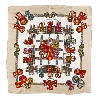 1323. A silk scarf by Hermès, "Les rubans du cheval".