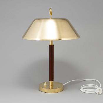 A brass and leather table light from Falkenbergs Belysning, second half of the 20th Century.