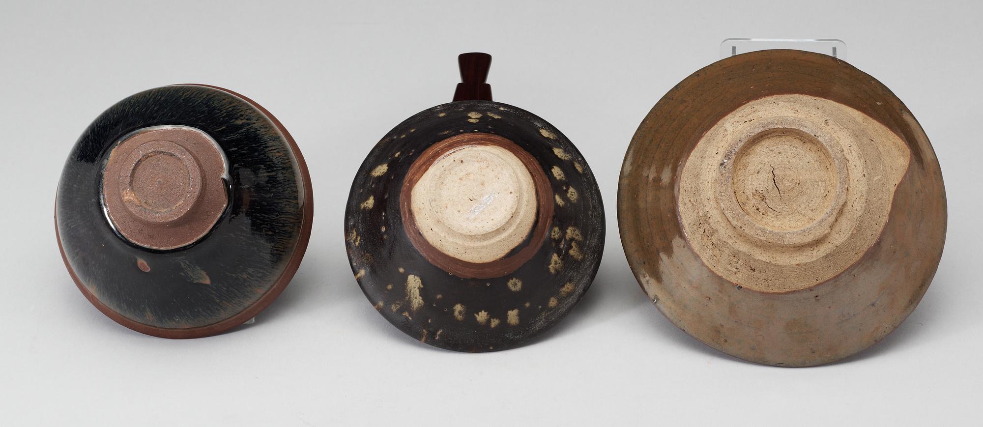 Three bowls, temmoku, a brown glazed and a brown-spotted glazed, Song dynasty (960-1279).