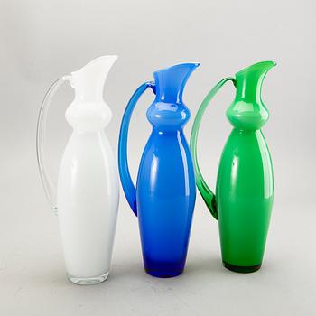 Anne Nilsson, a set of three glass decanters.