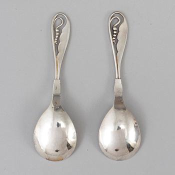 GEORG JENSEN, a pair of silver spoons, mid 20th century.