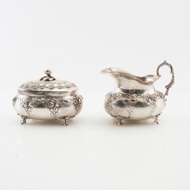 Sugar bowl, cream jug, tray and sugar tongs, 5 dlr silver, Swedish import marks, Rococo style.