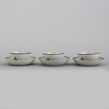 Three Chinese porcelain cups and saucers, late 18th Century.