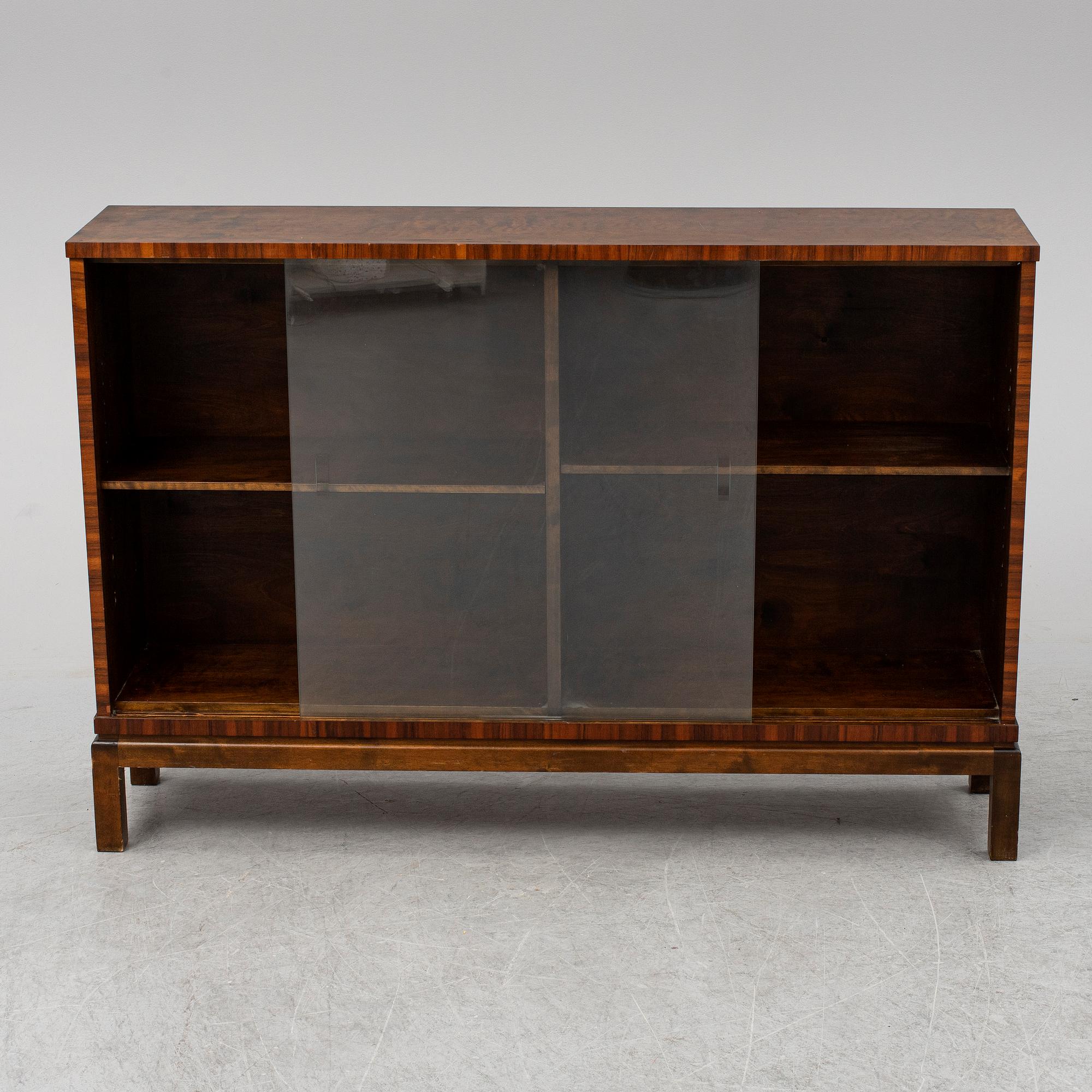 A stained birch veneered bookcase, 1930's.