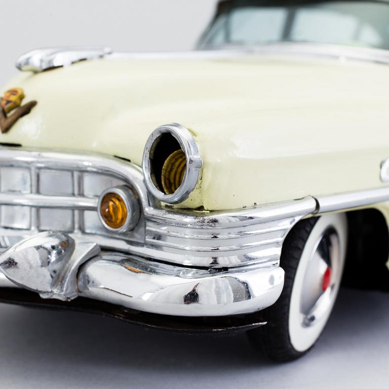 A tinplate Marusan Cadillac, Japan, ca 1951.