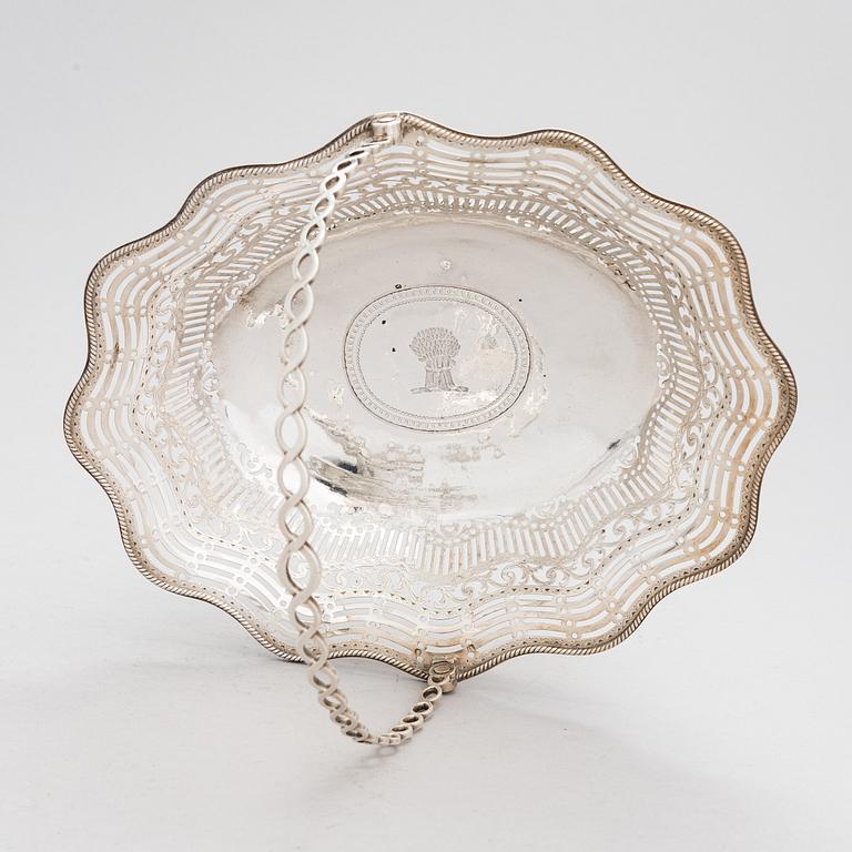 A George III sterling silver breadbasket, maker's mark of William Plummer, London 1777.