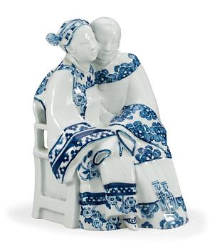 A Swedish 20th cent blue and white figurine, Rörstrand 1920s.