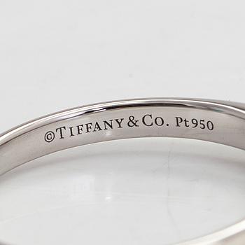 Tiffany & Co, a platinum ring with a diamond 0.19 ct. according to engraving.