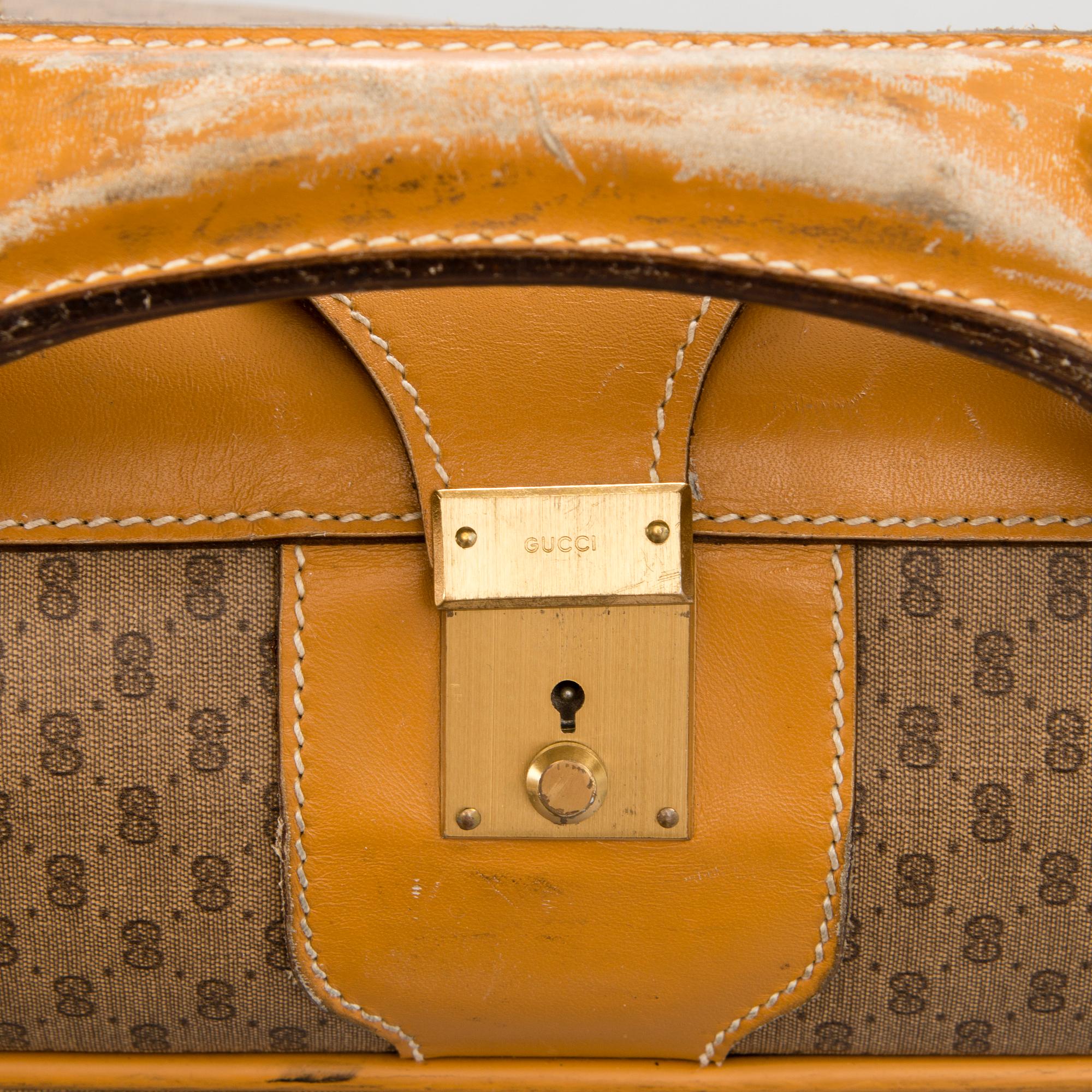 A Large Vintage Micro GG canvas Soft Suitcase.