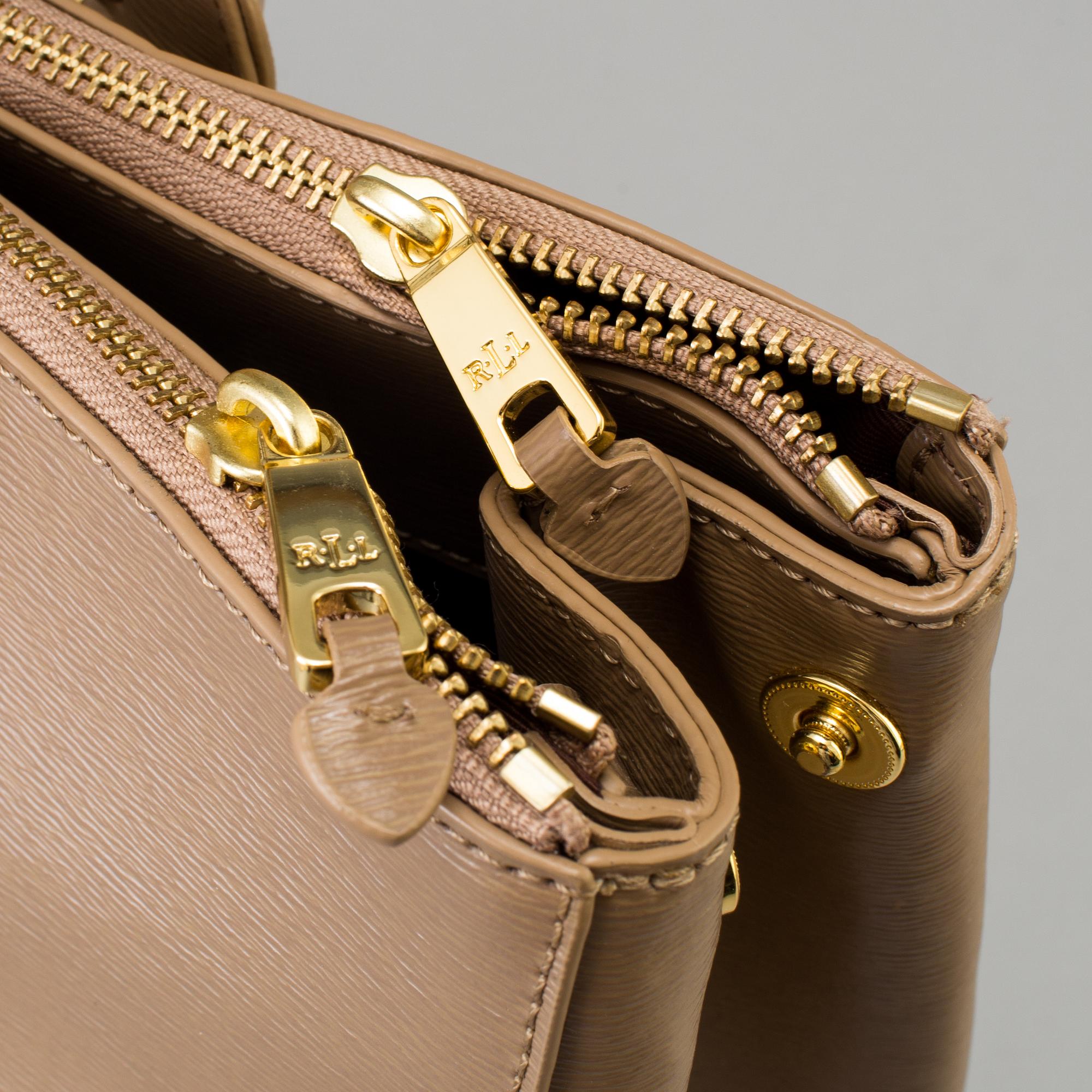 a Newbury Double Zip Satchel bag by Ralph Lauren. Bukowskis