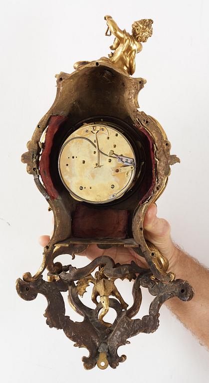 A Rococo mid 18th century cartel clock.