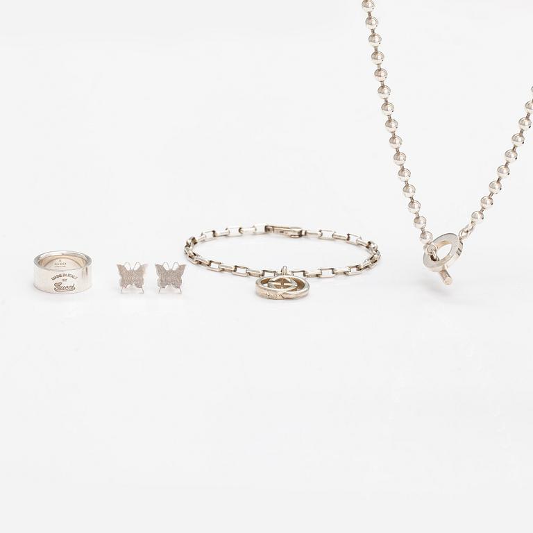 Gucci, A pair of earrings, bracelet, ring and necklace made of sterling silver. Marked Gucci, Made in Italy.