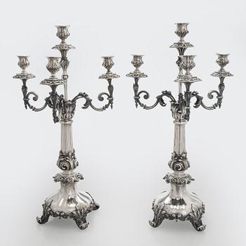 A pair of silver candelabra, maker marks of Carl Johan Tegelsten, Saint Petersburg 1850.