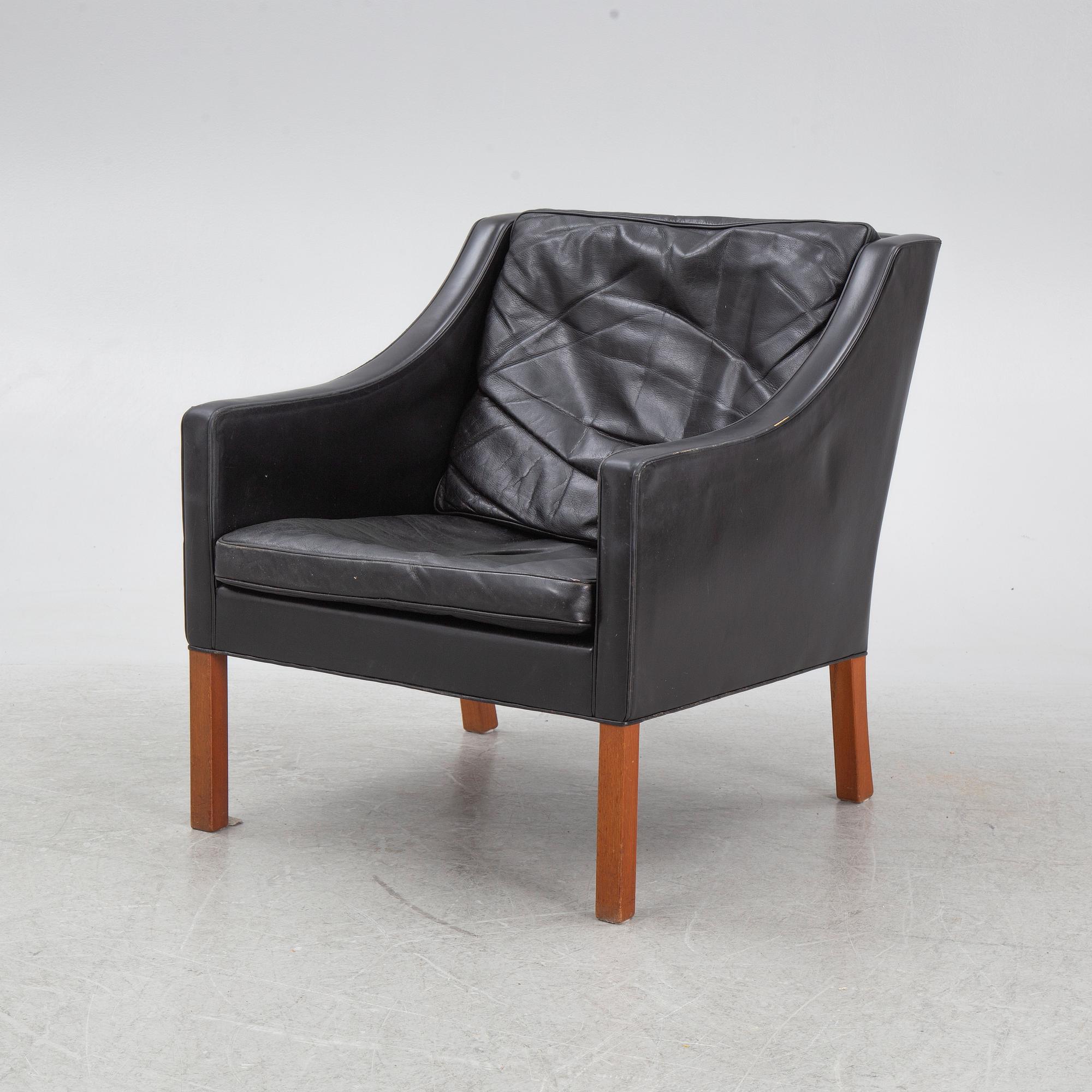 Børge Mogensen, a model 2207 armchair with ottoman, Fredericia Stolefabrik, Denmark, second half of the 20th century.