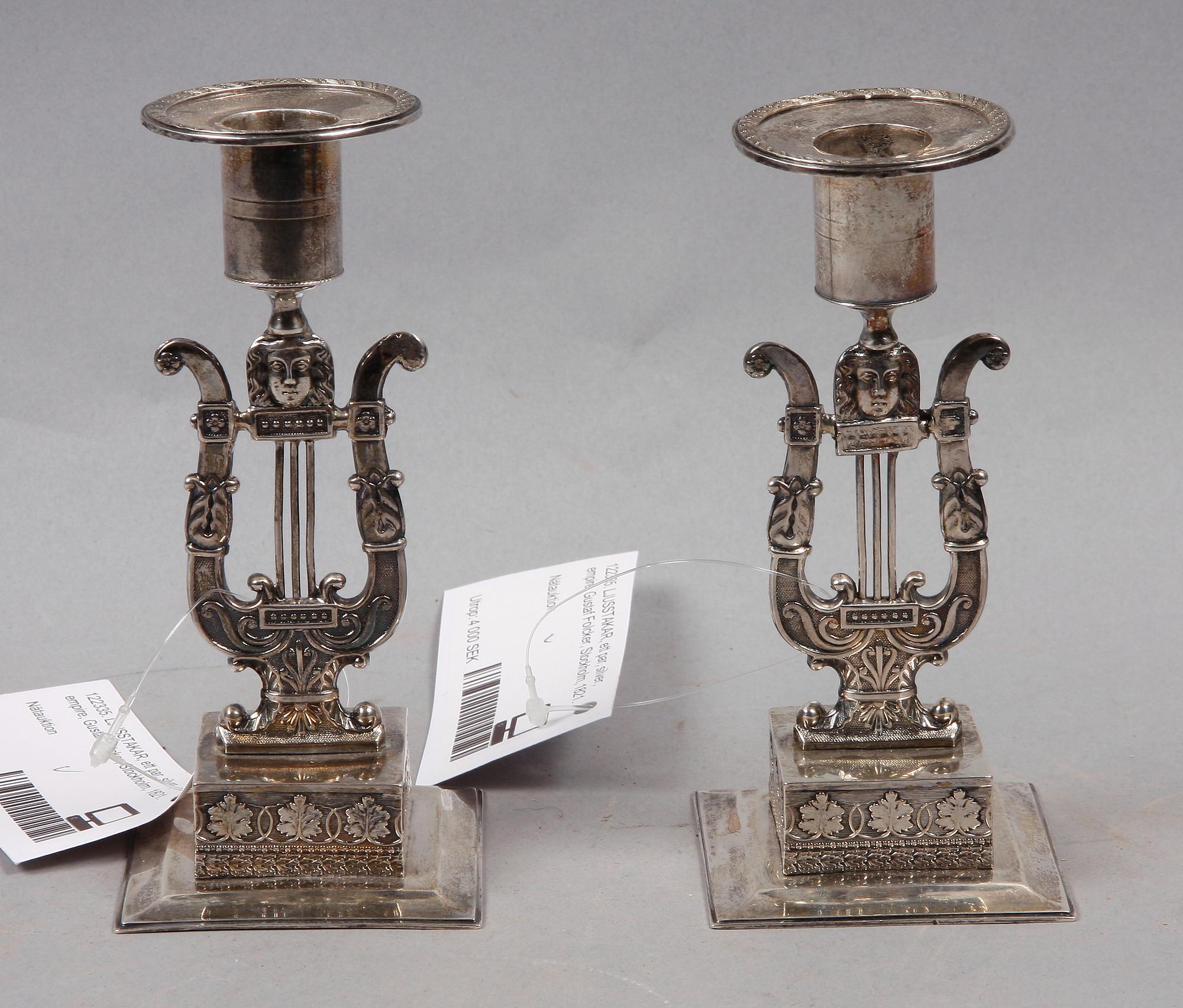 LJUSSTAKAR, ett par, silver, empire, Gustaf Folcker, Stockholm, 1821.