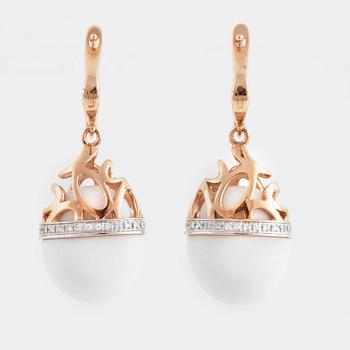 A pair of brilliant cut diamond and white agate earrings.