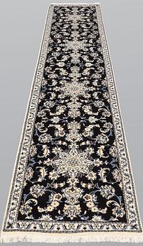 A runner, Nain, part silk, ca 378 x 77 cm.